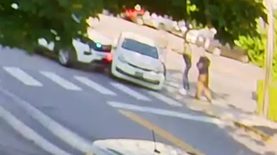 Surveillance video appears to show men surrounding, pulling driver from car in Maine