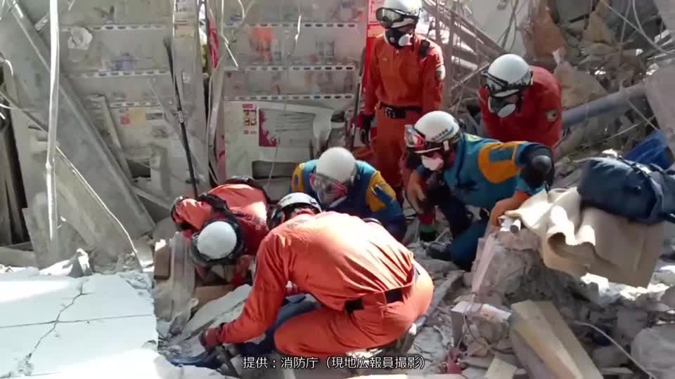 Rescuers race to save trapped in Japan's quake hit paper mill and mall