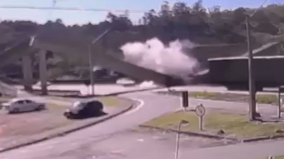 Policial fica ferido após carro pegar fogo em acidente na Via Dutra, em SP