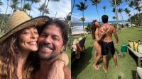 Juliana Paes posa agarrada ao marido em praia paradisíaca