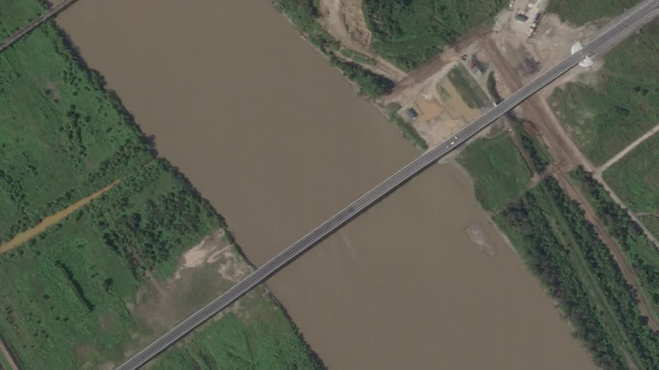 Satellite images show before and after of first road bridge between Russia, N Korea