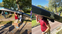 Maratonista de 38 anos completa competição com canoa na cabeça para chamar a atenção do público e protestar: "Essa causa, ao meu ver, vale muito mais"