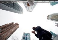 China corta taxas de empréstimo e intensifica estímulo para impulsionar economia