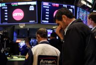Wall Street encerra em alta com expectativa sobre juros e balanços