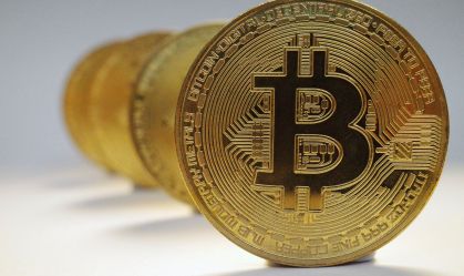 Criptomoedas: bitcoin oscila entre ganhos e perdas, após dados e juros