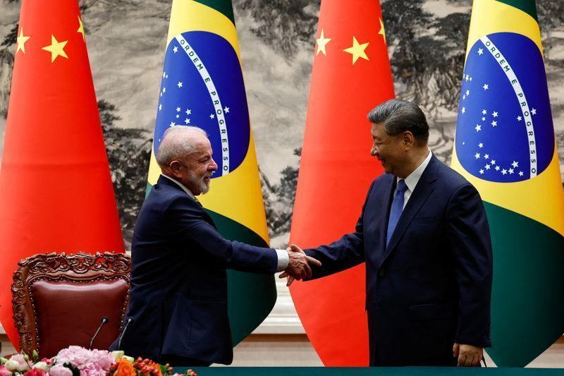 Lula cumprimenta o presidente da China, Xi Jinping