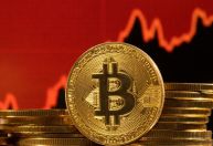 Bitcoin cai, sem perder nível de US$ 103 mil, pressionado por projeção do Fed