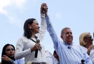 Oposição venezuelana convoca protestos em Madri após González partir para a Espanha
